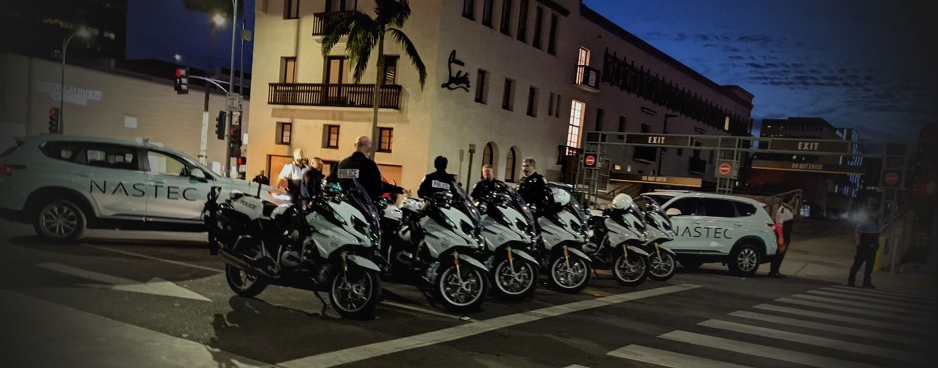 Picture of Nastec security people with their cars and bikes