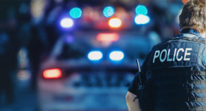 Picture of a police person from backside